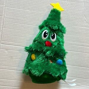 Huntington home-rocking around the Christmas tree, plush, animated singing tree.